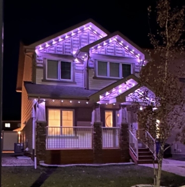 Property Kings Services permanent soffit lighting on a modern Saskatoon house