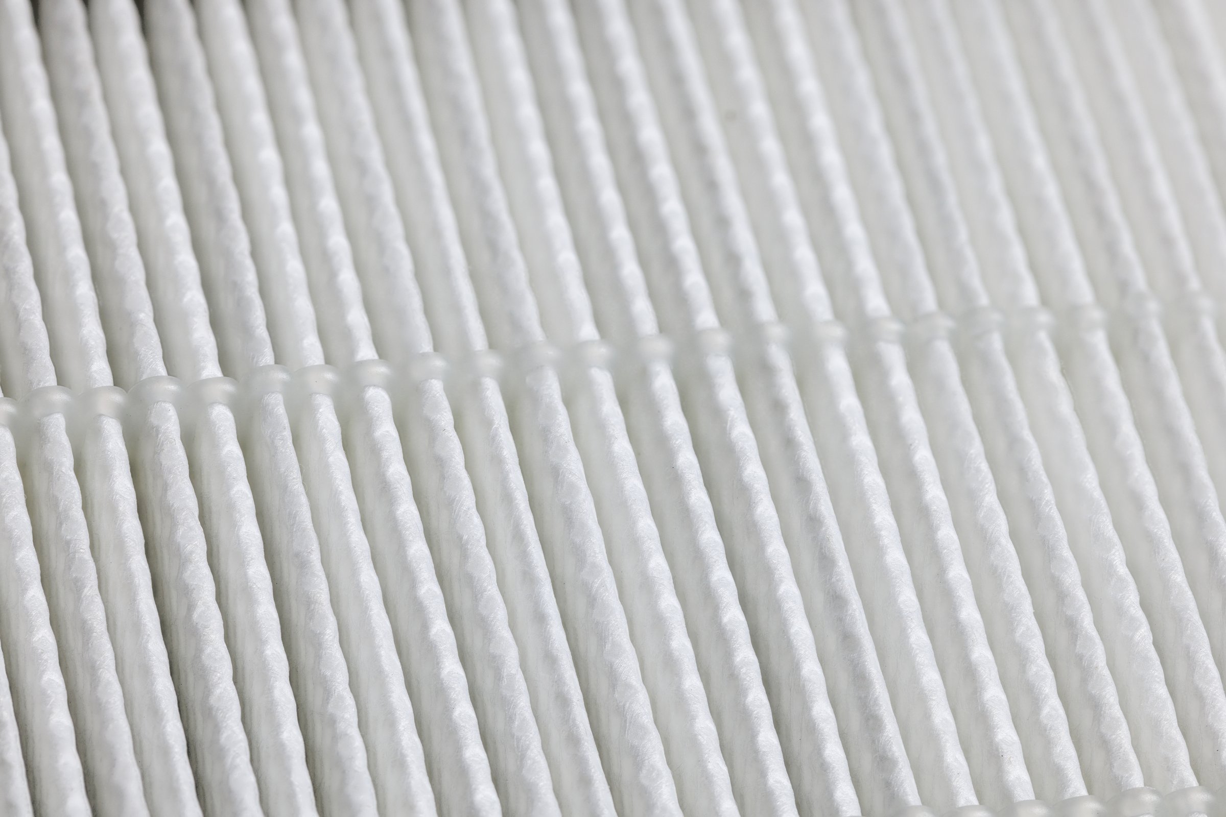 closeup full-frame view of white linear HEPA - high effective particle air - filter