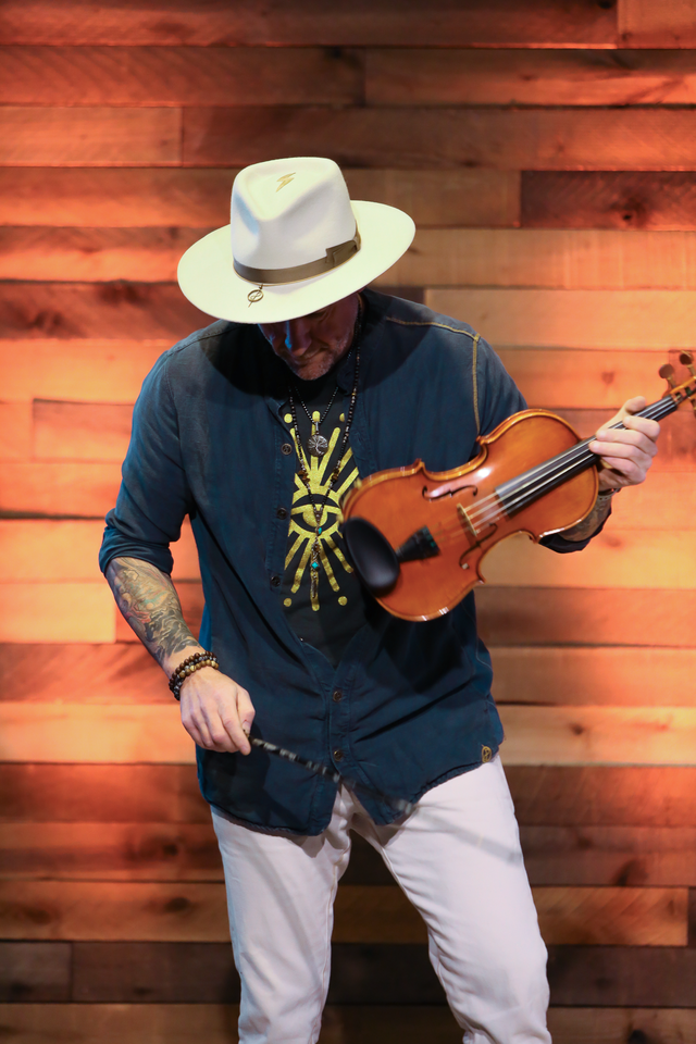 Carl Schmid playing violin