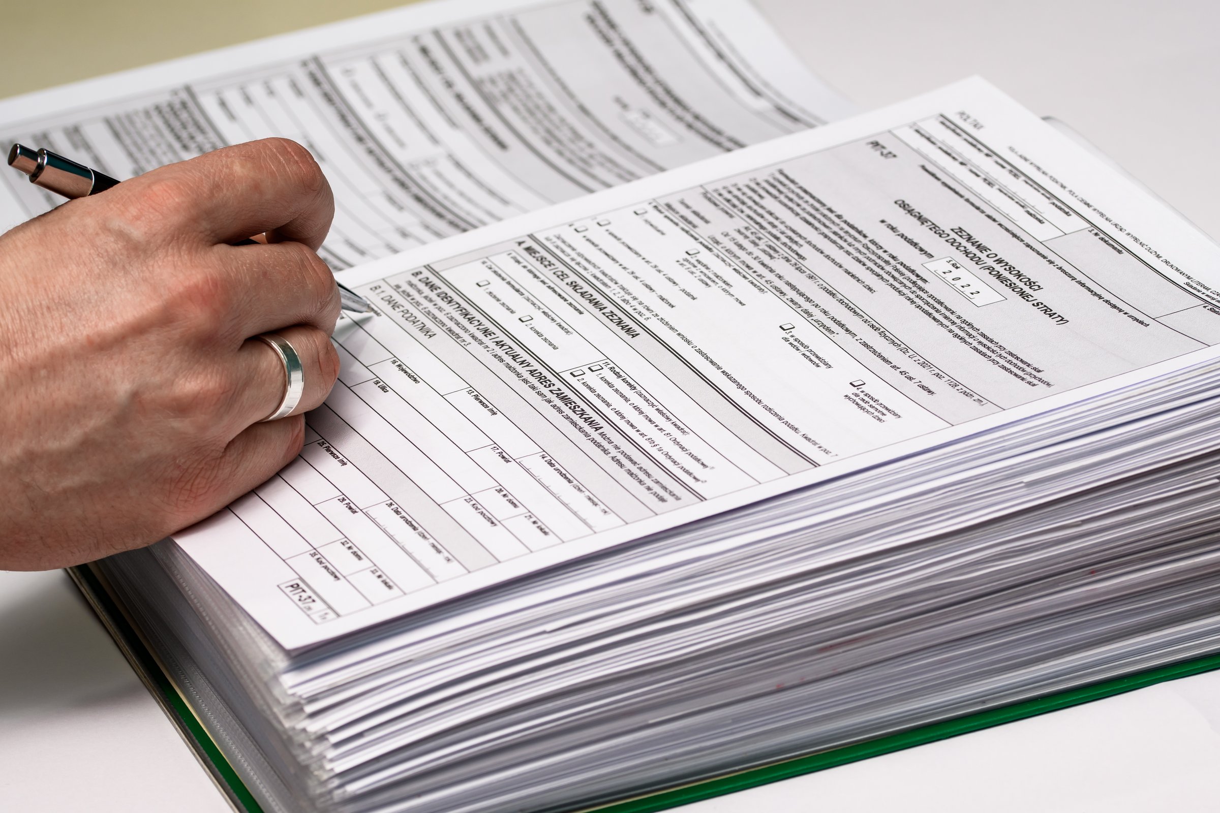 full binder of tax documents papers