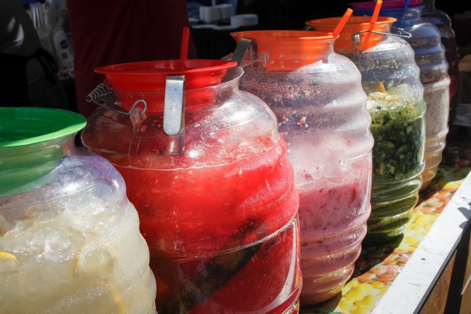 A view of large vats of aguas frescas, seen at a local Mexican restaurant.