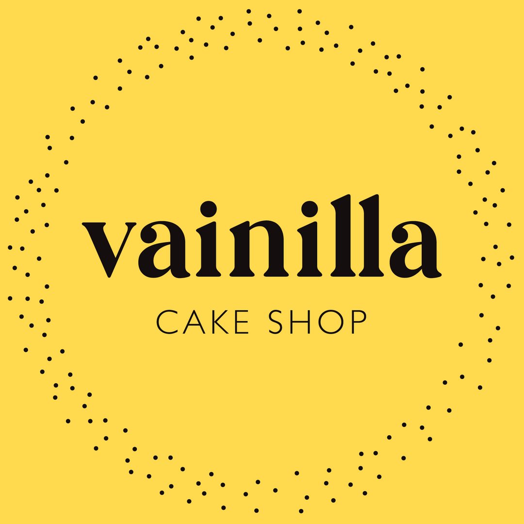 Yellow logo with the words Vainilla Cake Shop surrounded by a dotted circular pattern.