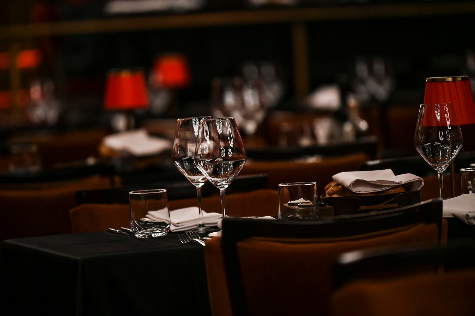luxury elegant red table setting for dinner in a restaurant