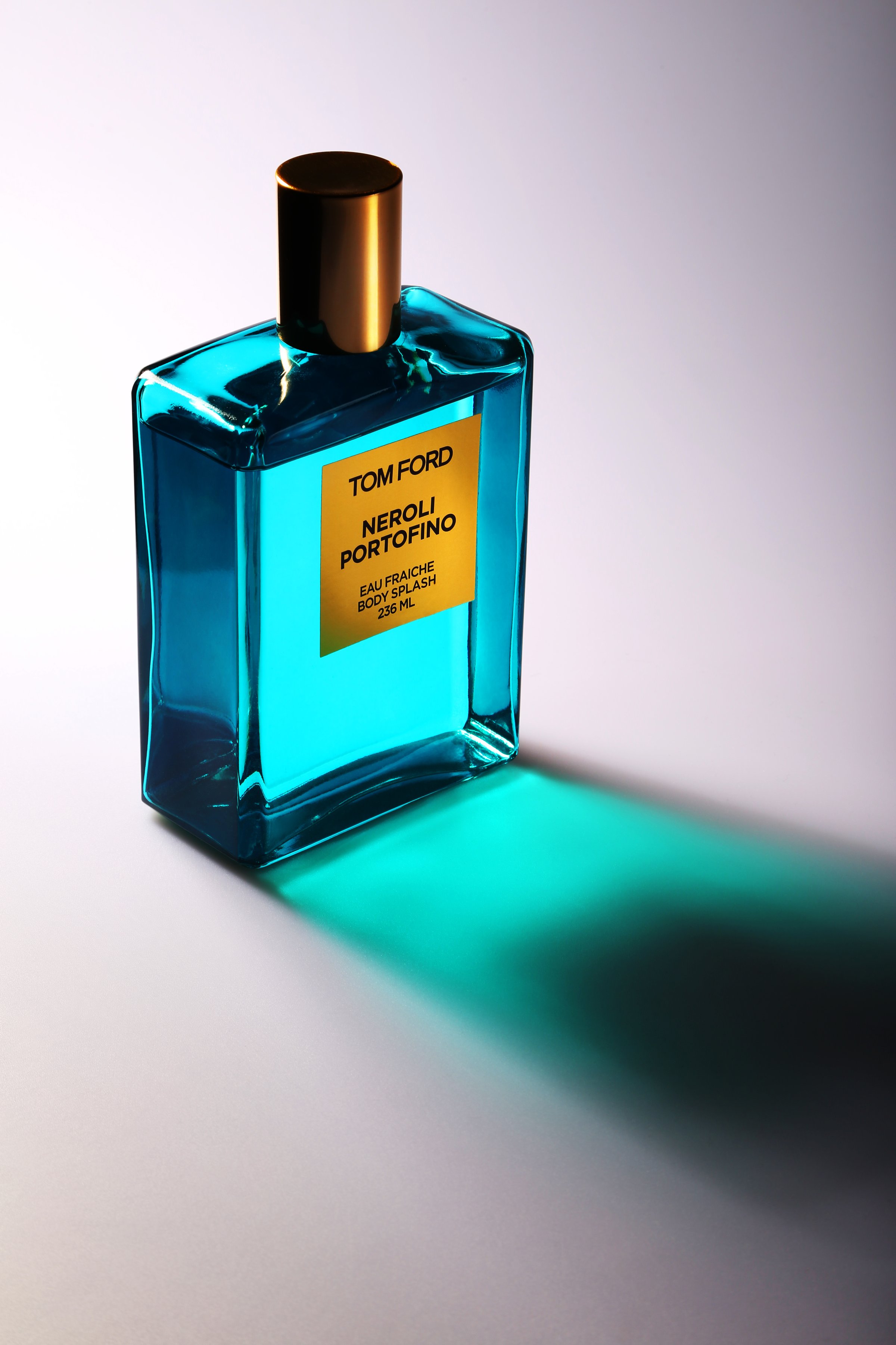 Brooklyn, New York, USA - December 16, 2014: 236ml Tom Ford Neroli Portofino Eau Fraiche Body Splash product shot on white to gray gradient background with bluish green cast and soft shadow in an angle on ground.