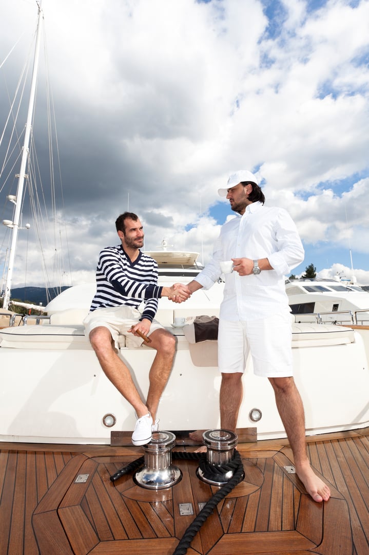 Young businessman dooing business on board a luxury yacht. Toned imageMore like this