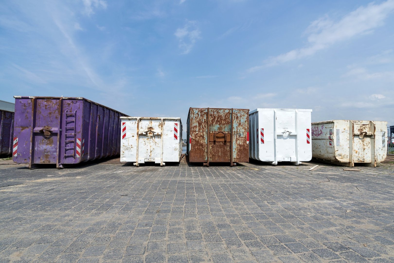 group of roll-off containers