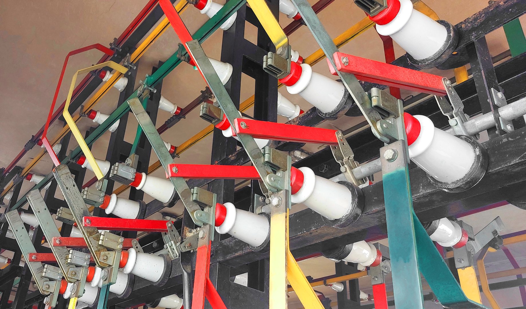 many ciorcuit breakers inside the old power Electrical substation without people