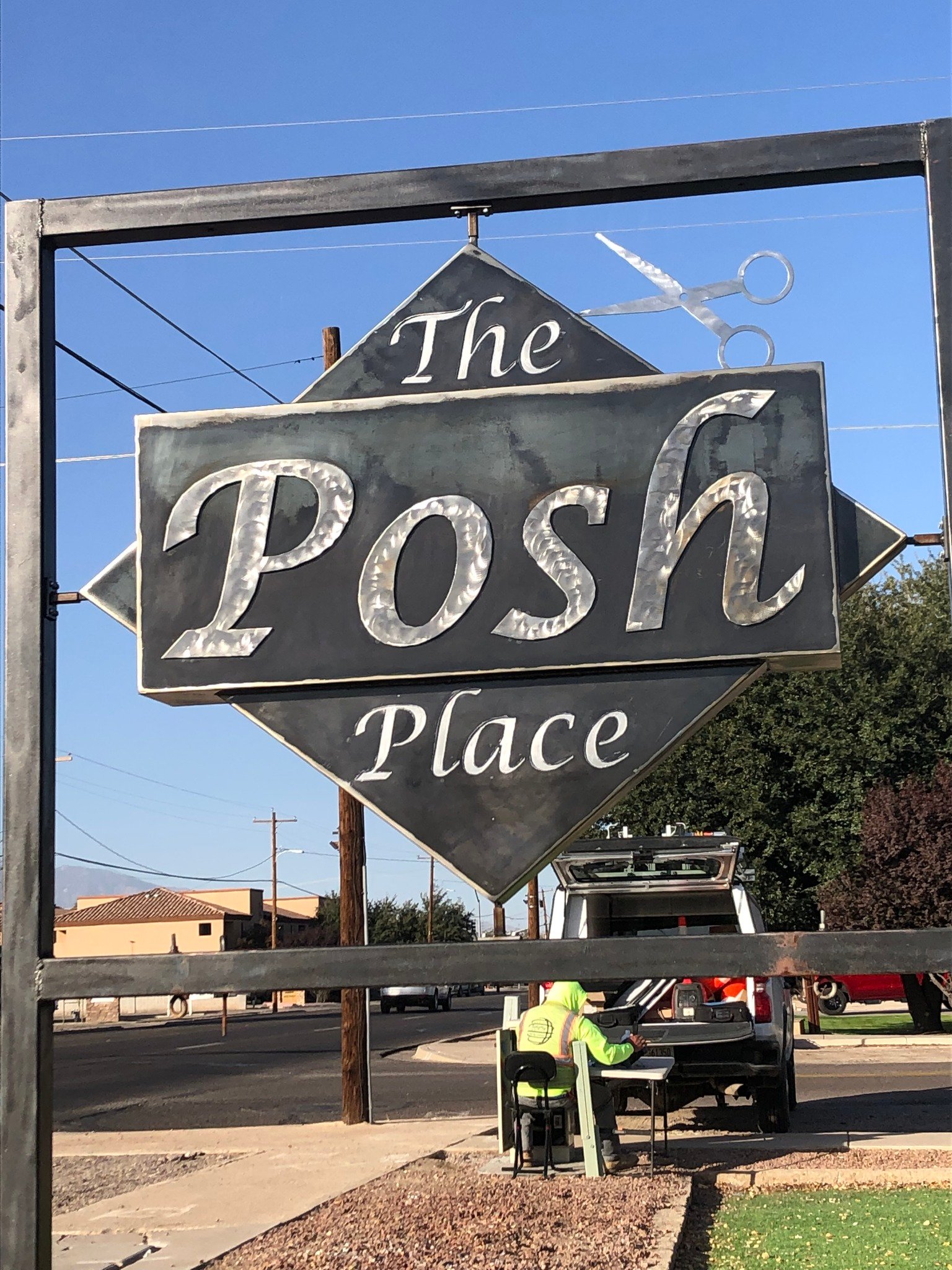 Custom POSH metal signage by Twisted Logic