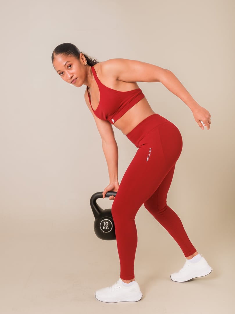Woman training with barbell