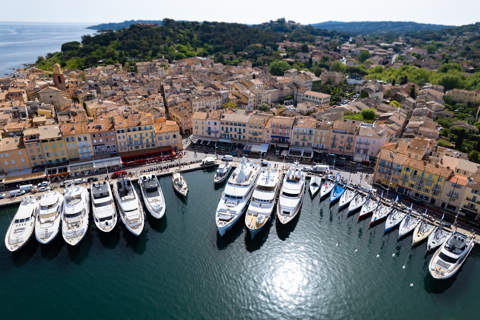 Aerial view of Saint Tropez with Mega Yachts and Sail boats getting ready for racing on Regatta Day