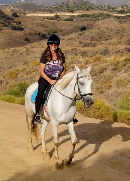 Horse riding through Spanish countryside