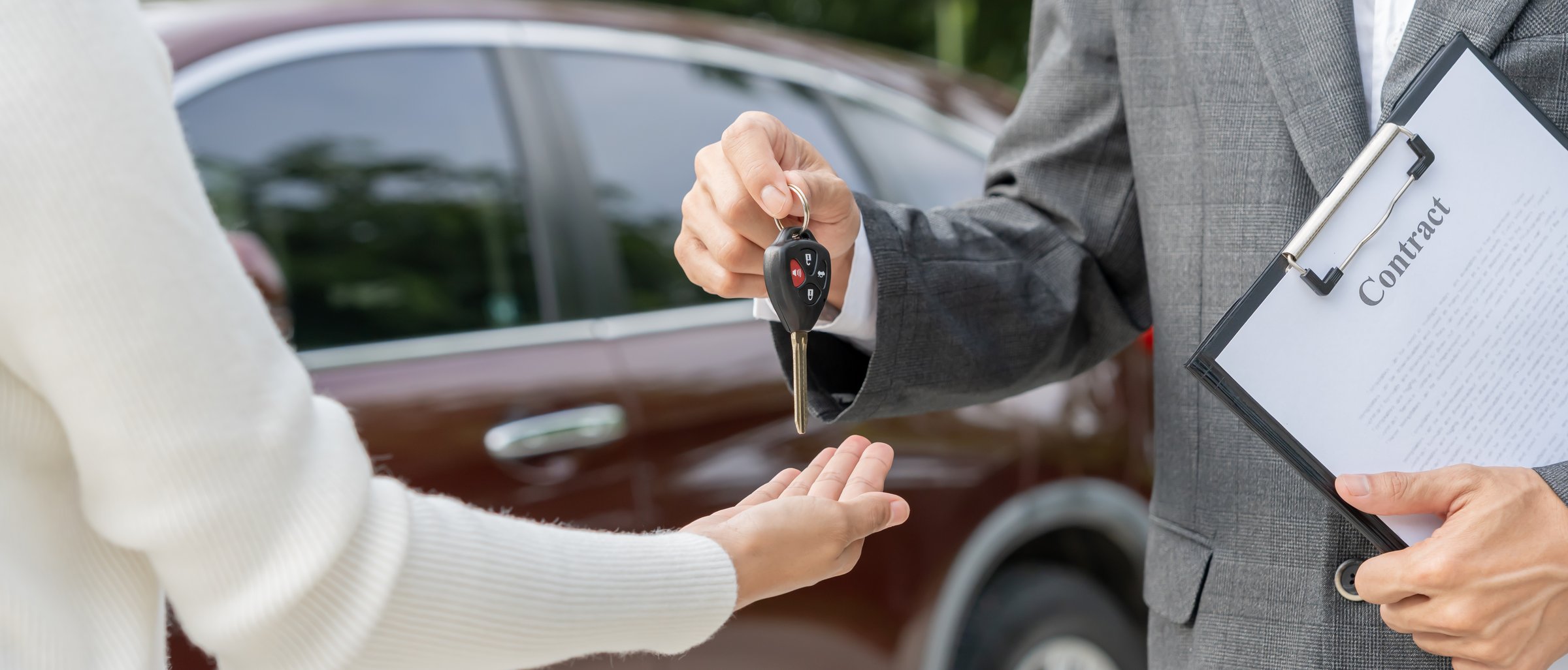 lease, rental car, sell, buy. Dealership manager send car keys to the new owner. Sales, loan credit financial, rent vehicle, insurance,  renting, Seller, dealer, installment, car care business