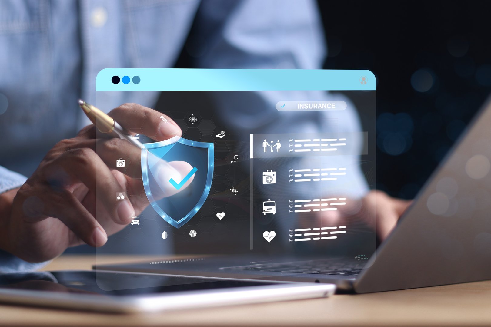 Businessman using computer for insurance