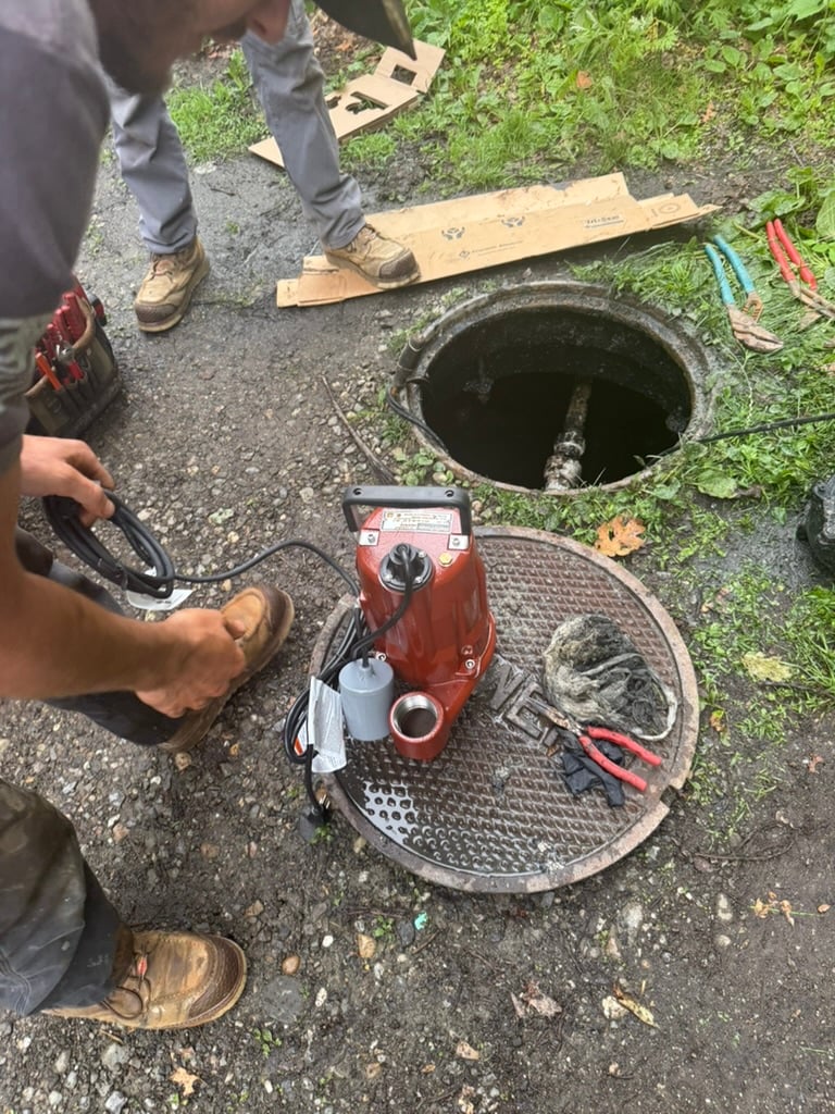 Griffen Pump Service technician working on wastewater system sewage pump installation and maintenance in Dutchess County NY