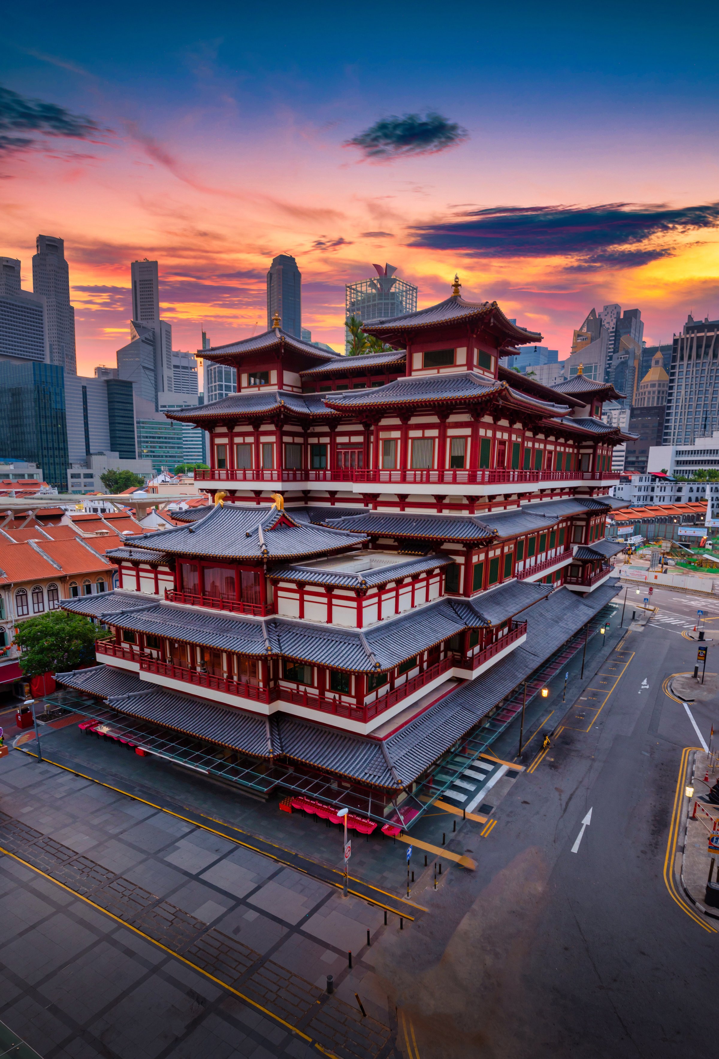 Buddha Tooth Relic Temple at sunrise in China town, Singapore.