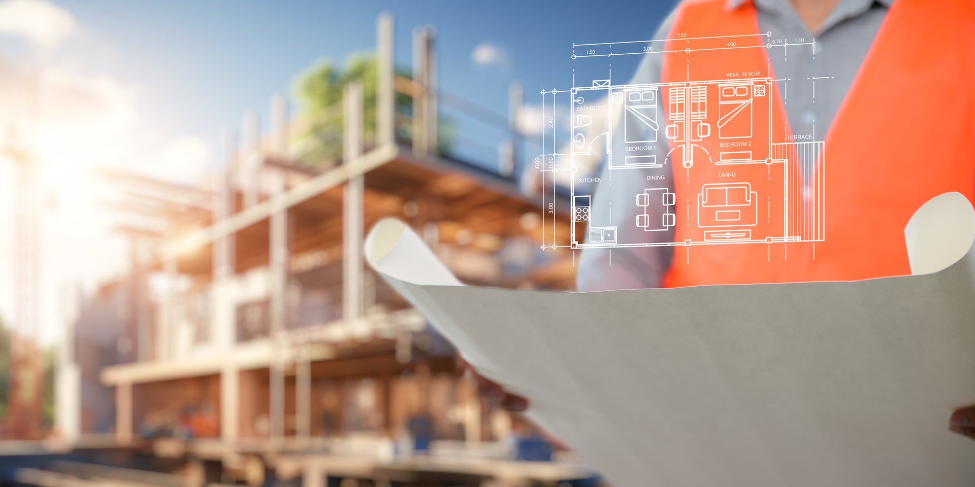 Engineer holding construction blueprint template for building, house, checking accuracy.