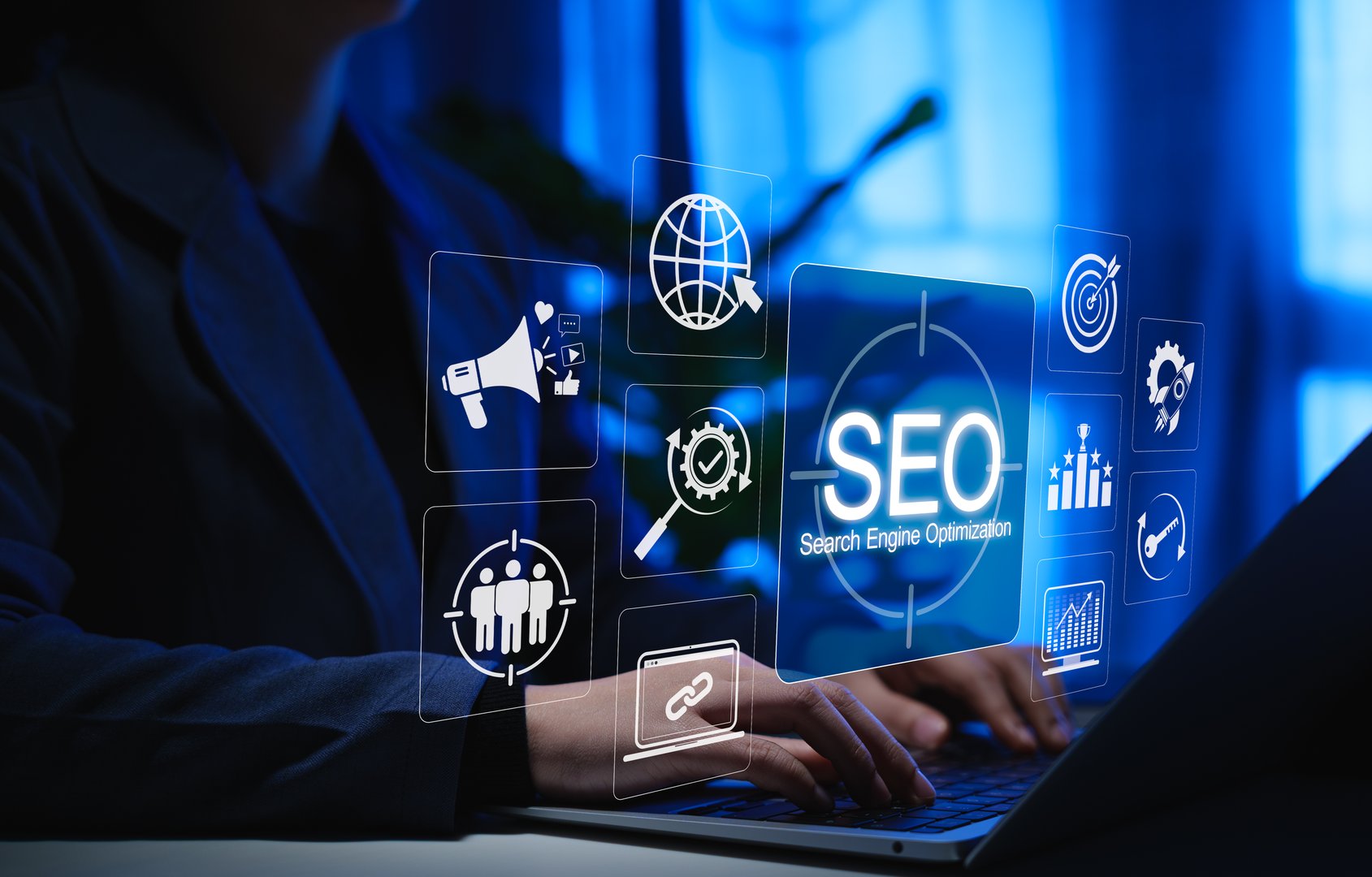 SEO Marketing and Search Engine Optimization Strategy Concept. Person using laptop with icons SEO, marketing tools, link building, keyword strategy, online analytics for digital growth and visibility,
