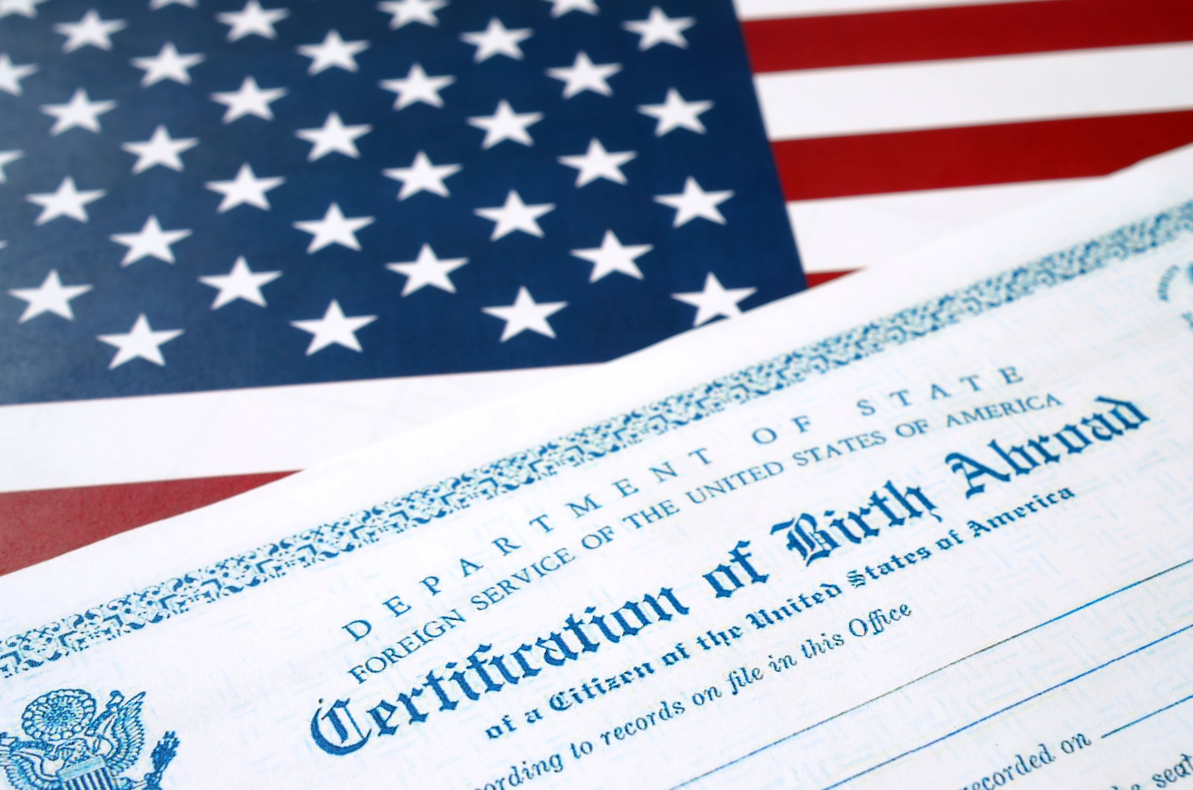 High Angle View Of Text Over Certificate And American Flag