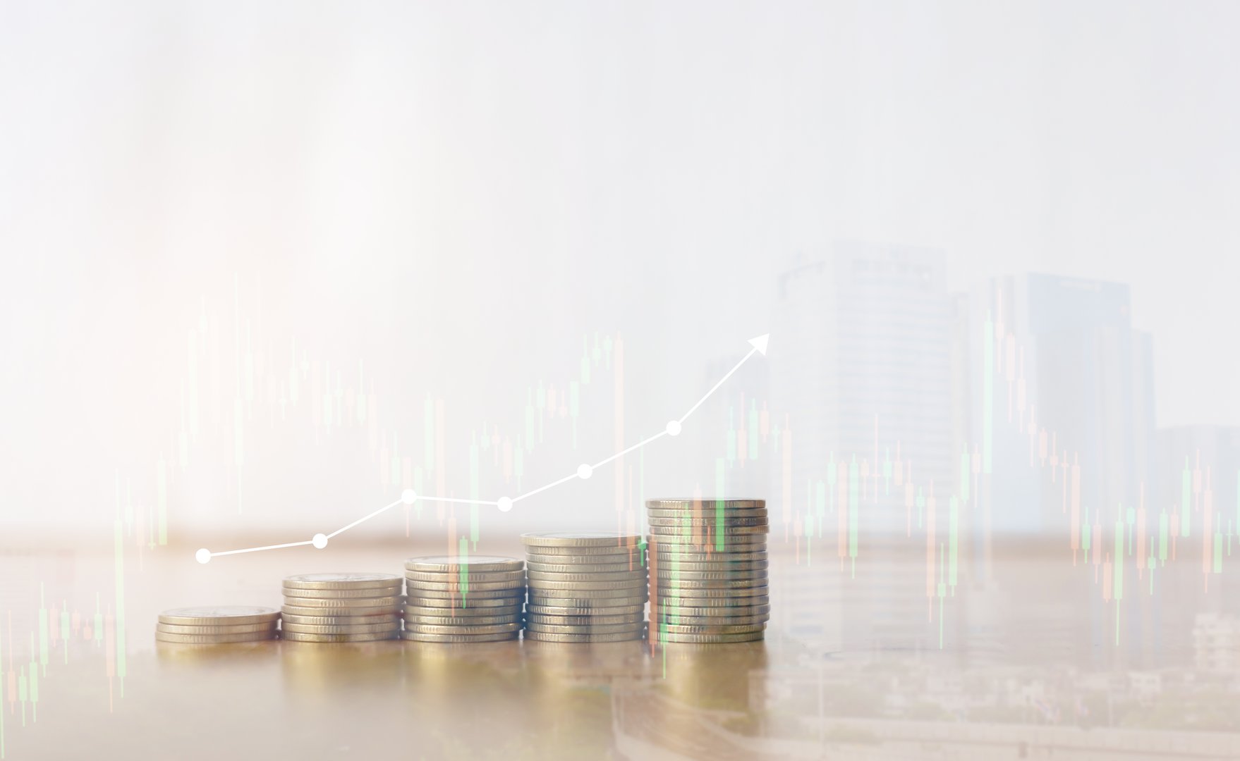 stack gold color of money coin with double exposure background of real estate building and statistic graph or stock trading with growing arrow sign for global business financial and world fund concept