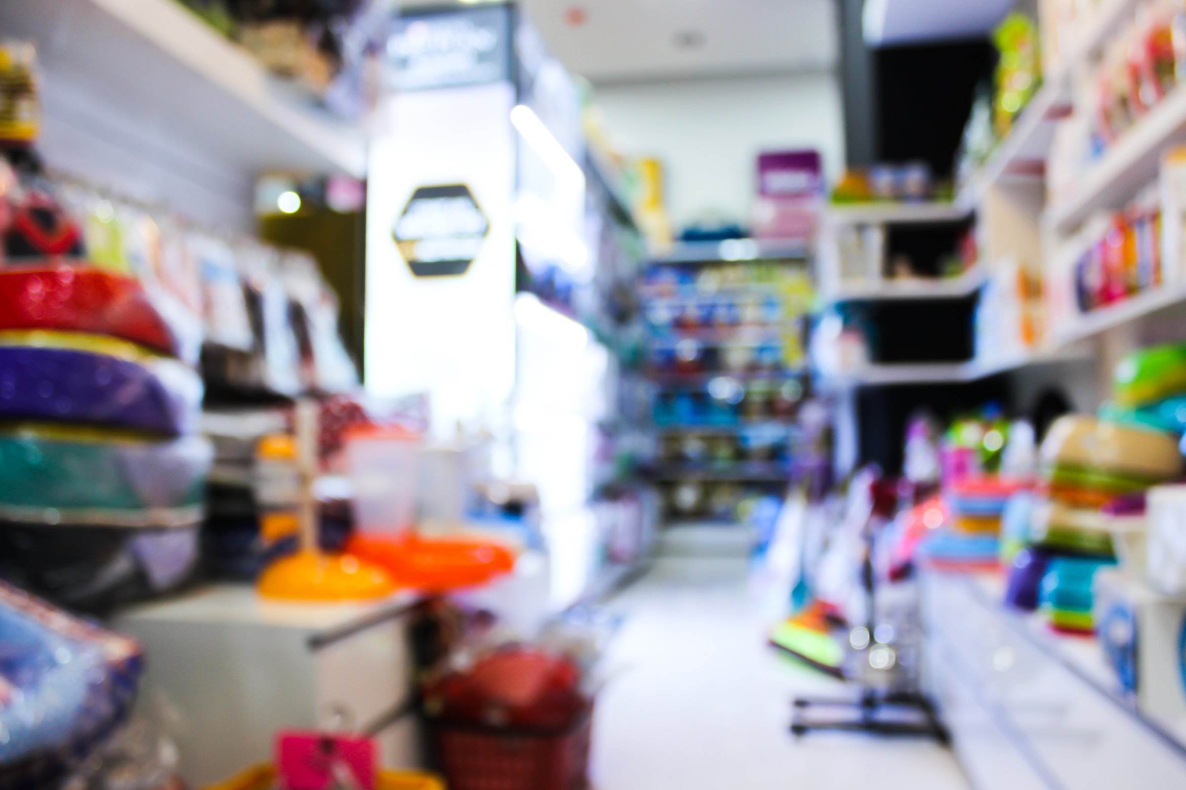 Interior of a modern pet food store with product shelves