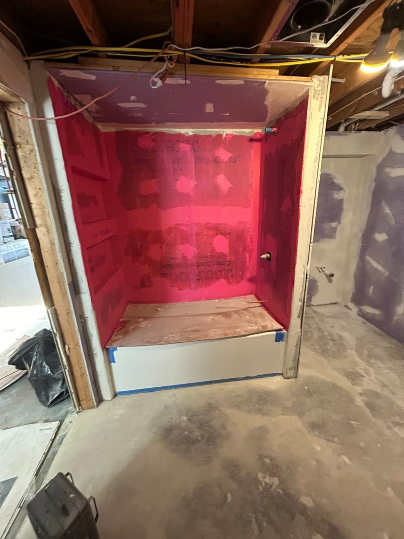 Custom stacked washer dryer layout Maumee basement remodel