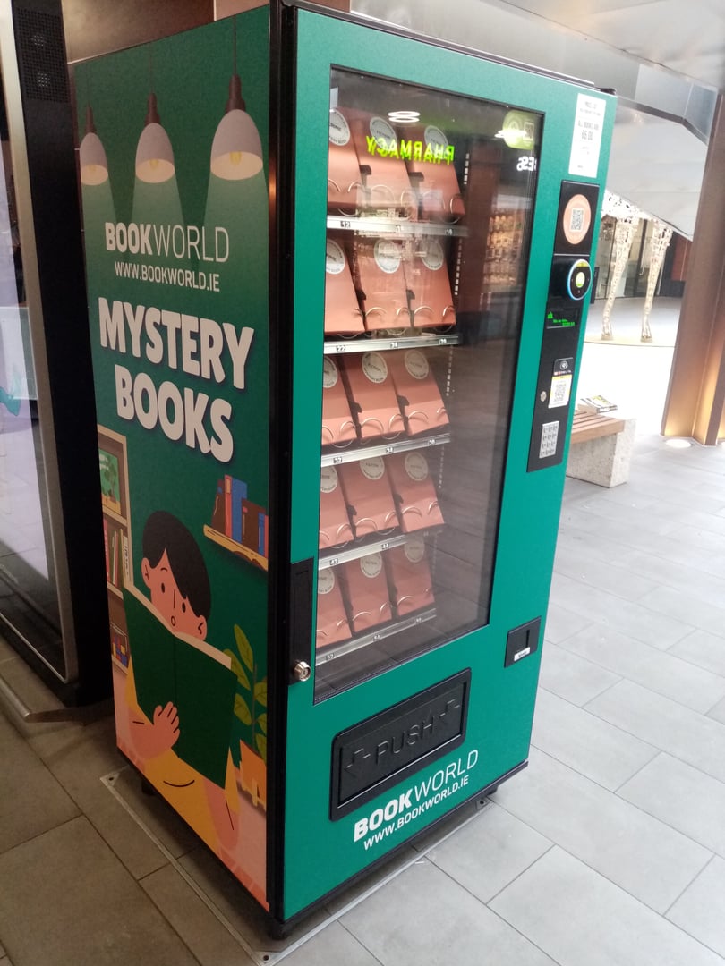 Unique book dispensing vending machine
