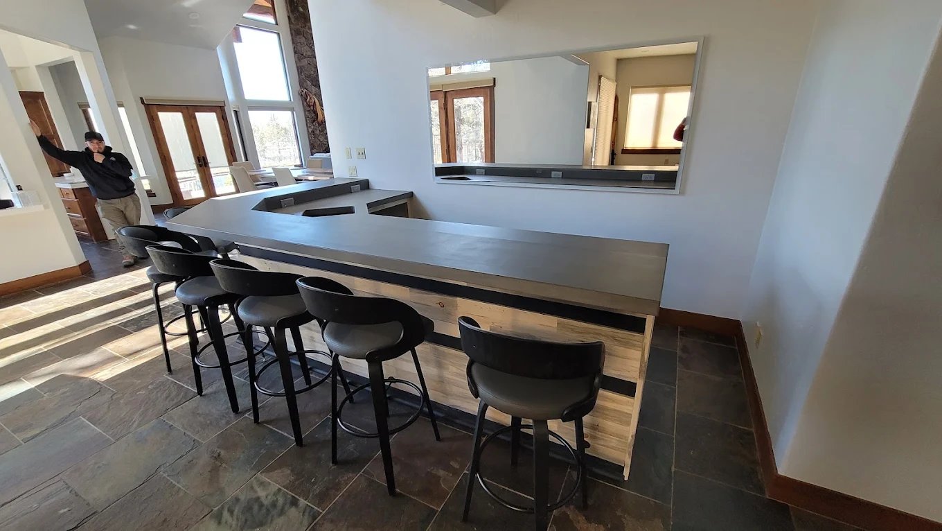 Beautiful modern kitchen remodel with white cabinets and pendant lighting