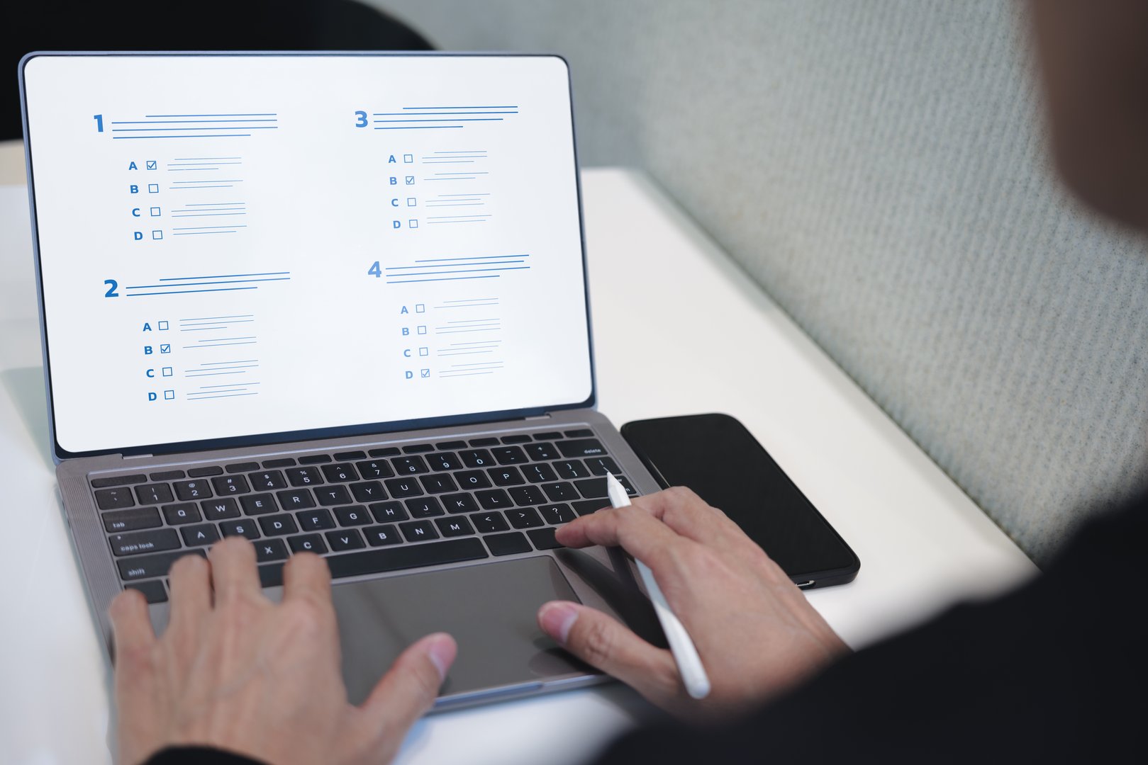 Businessman evaluating with checkbox on online laptop. assessment survey online, choose correct answer in test, questions test, online exam, quiz knowledge, filling out a survey form. Checklist online