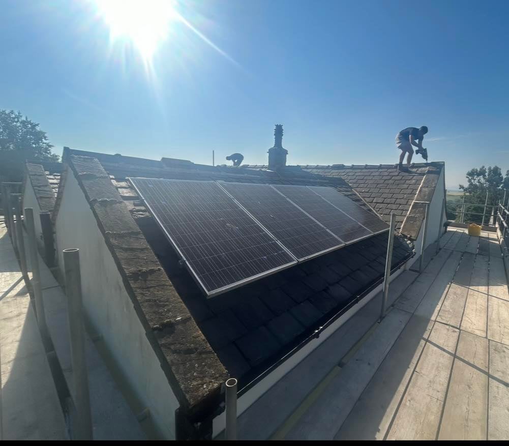 Professional roofing work in progress