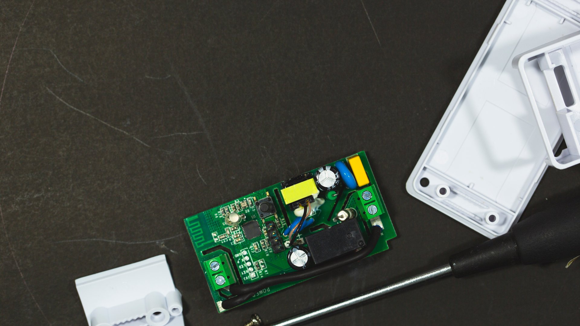 Top view of dis-assembled electronics part, details of circuit board with component, DIY concept.