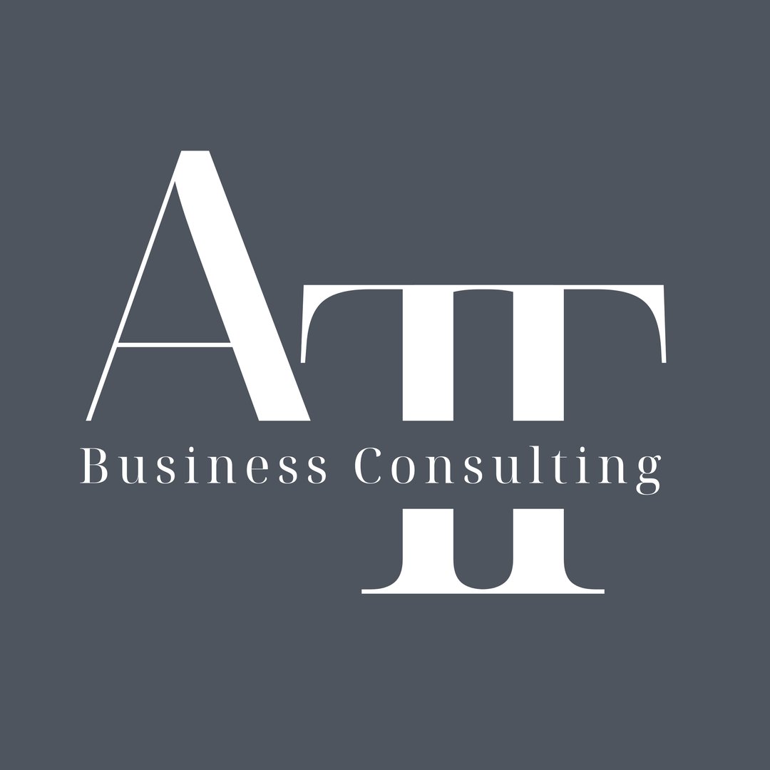 Logo with letters 'ATT' and text 'Business Consulting' on a gray background.