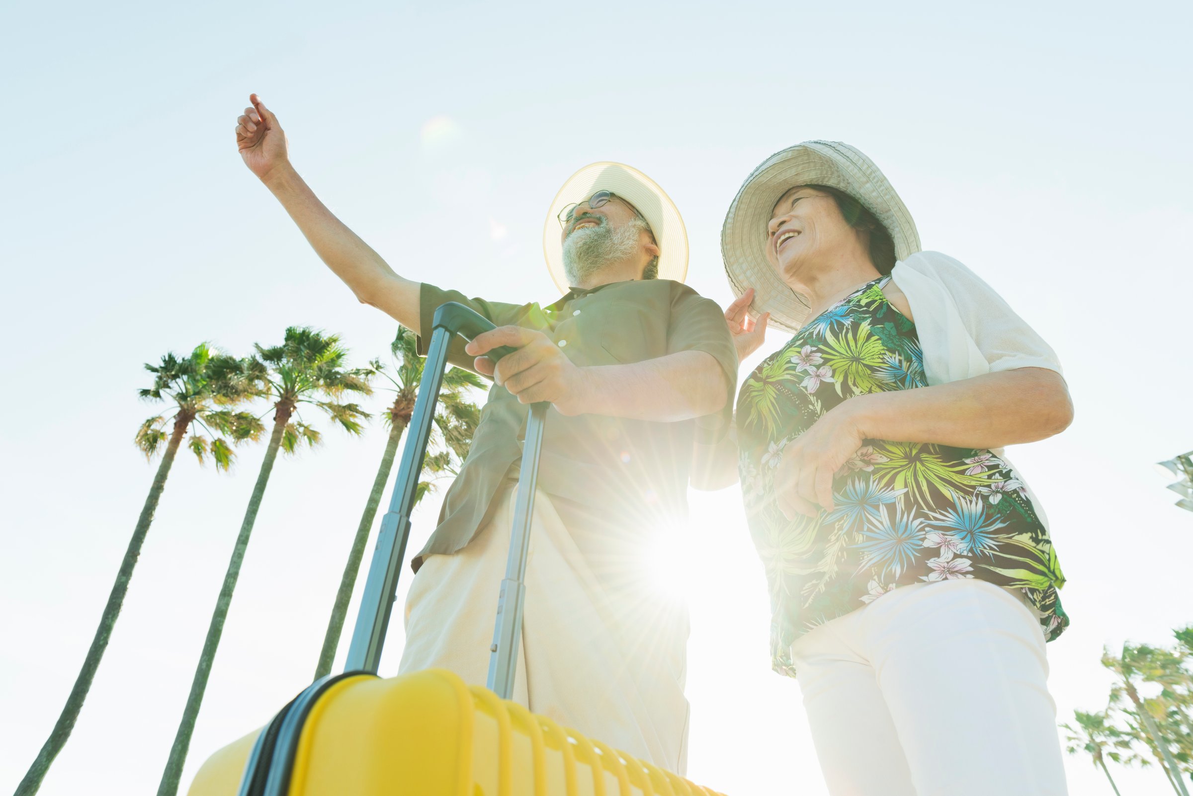 Senior couple traveling to a tropical country