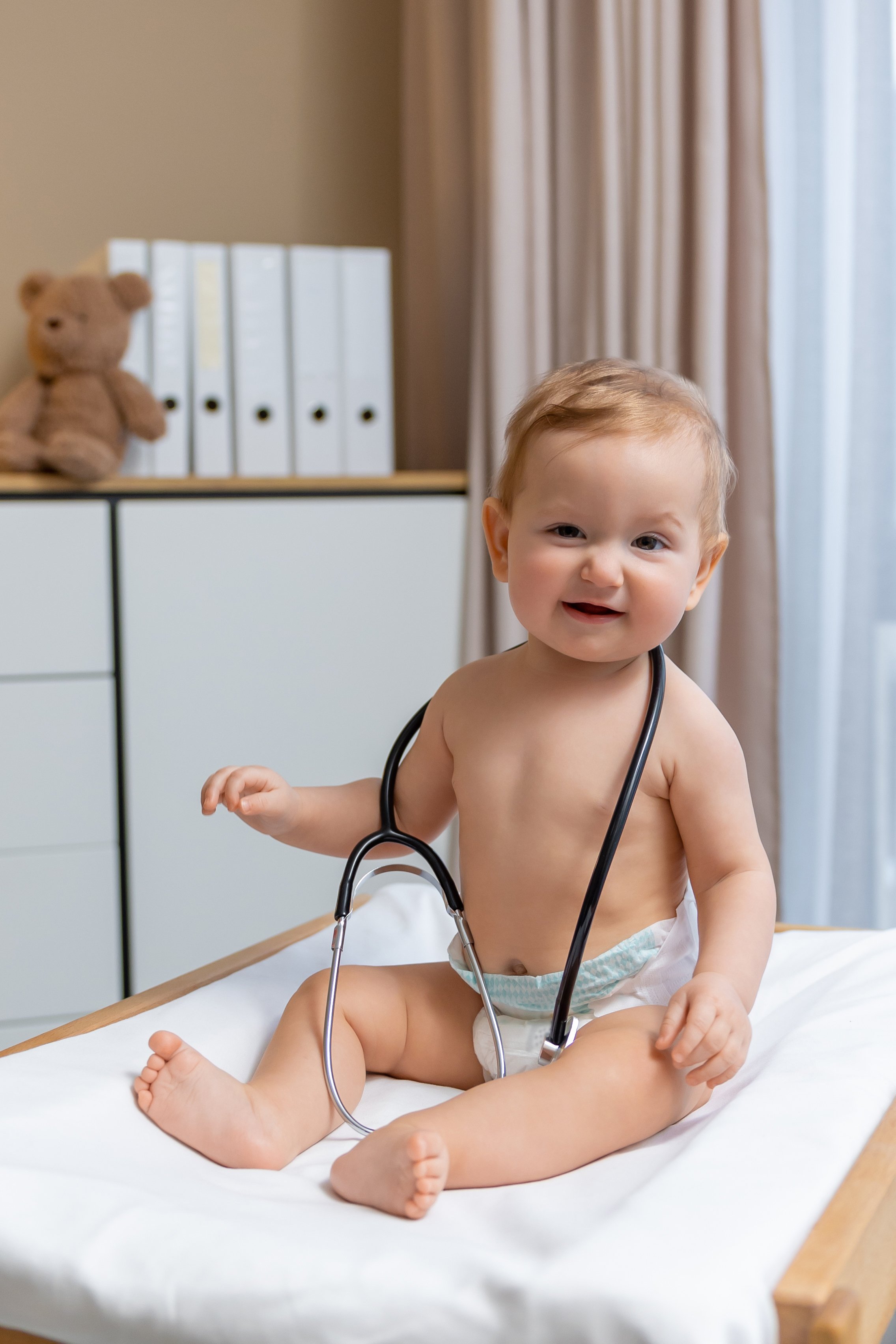 Doctor examining child lungs