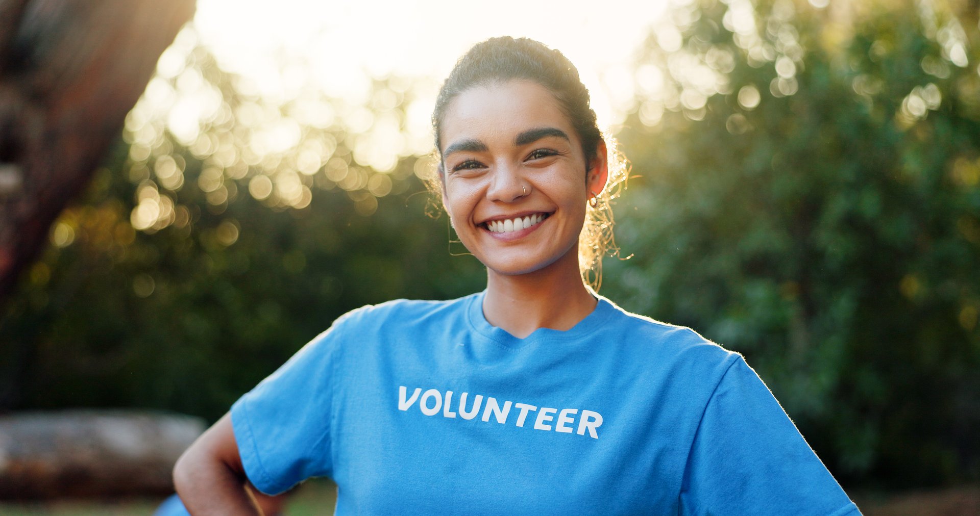 Volunteer, woman and happy with portrait at park for earth day project, community service or charity outreach. Sustainable NGO, girl and pride in nature for social responsibility, activism or support