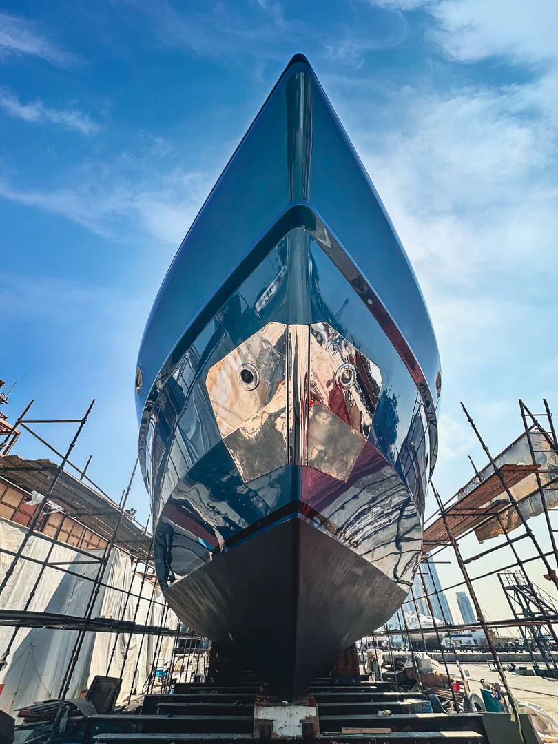 A beautiful blue boat in dry dock for repairs
