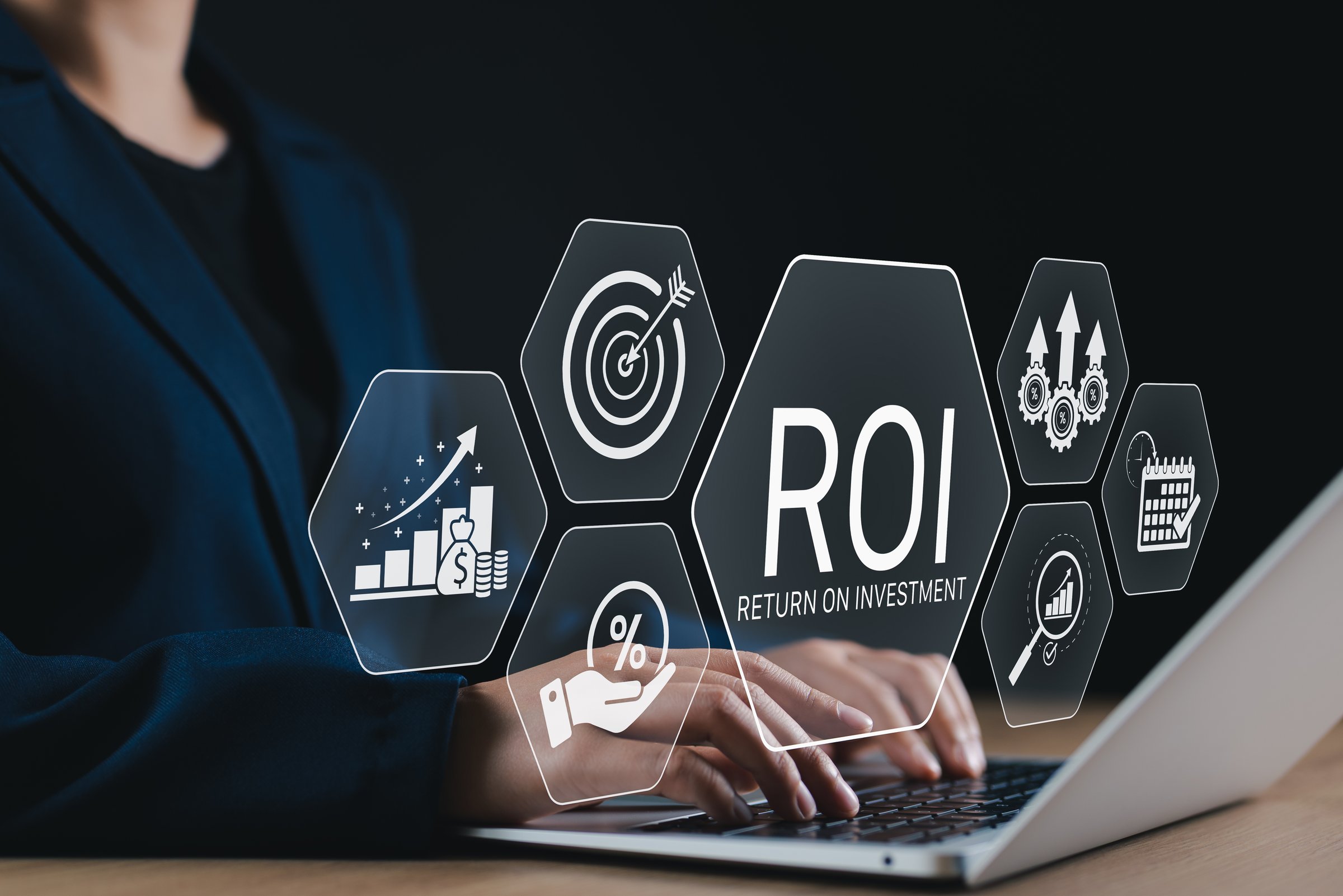 Analyzing ROI and Business Strategy Concepts. Businesswoman working on laptop with icons representing ROI, financial strategies, return on investment, and efficiency. calculate profit, marketing plan,