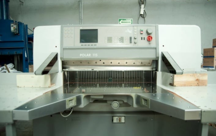 Professional female employees working in a printing house