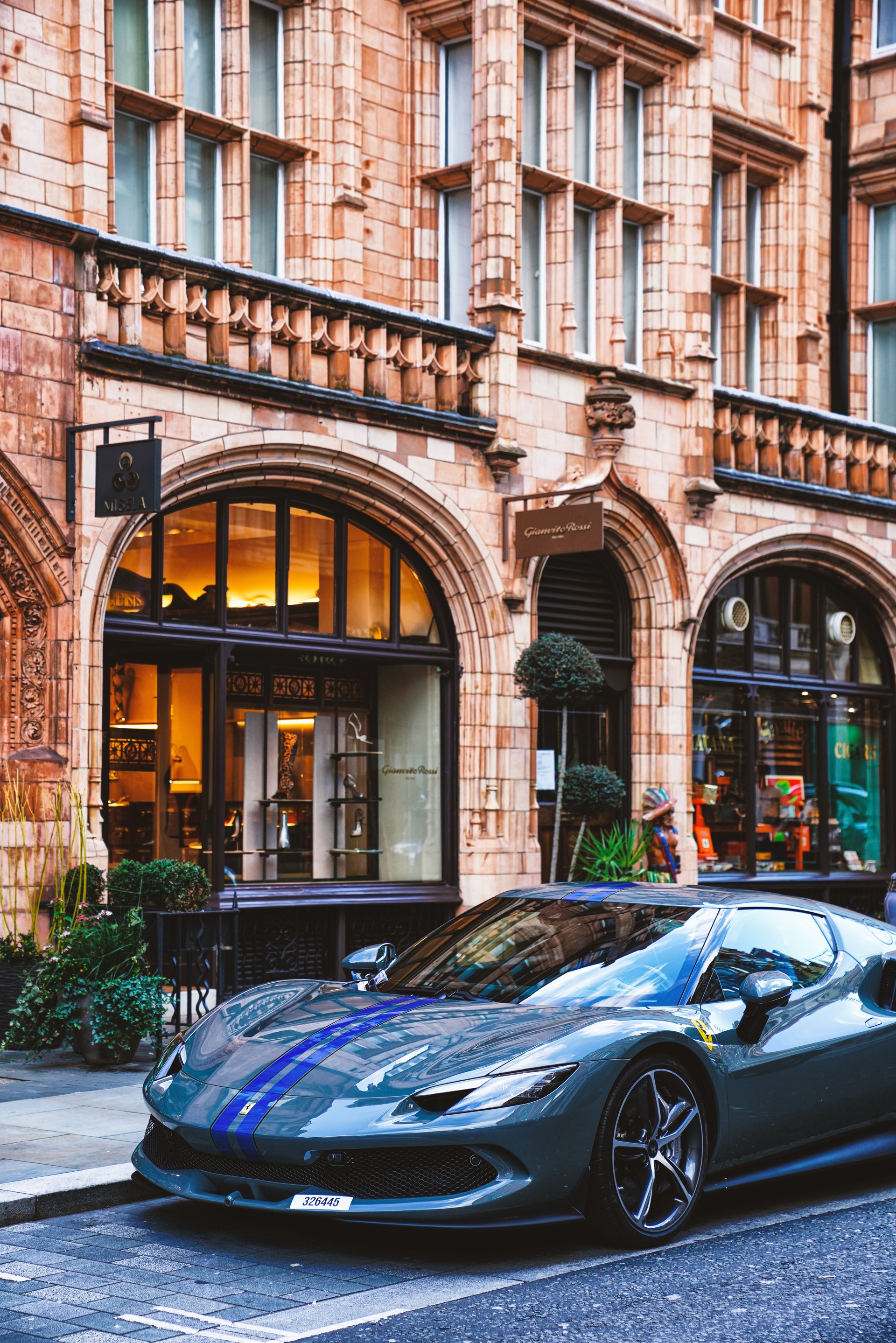 London, England, United Kingdom – 19th December 2024. A daytime street view in the central London area. a luxury, high-performance car. a Ferrari 296 prestige car.