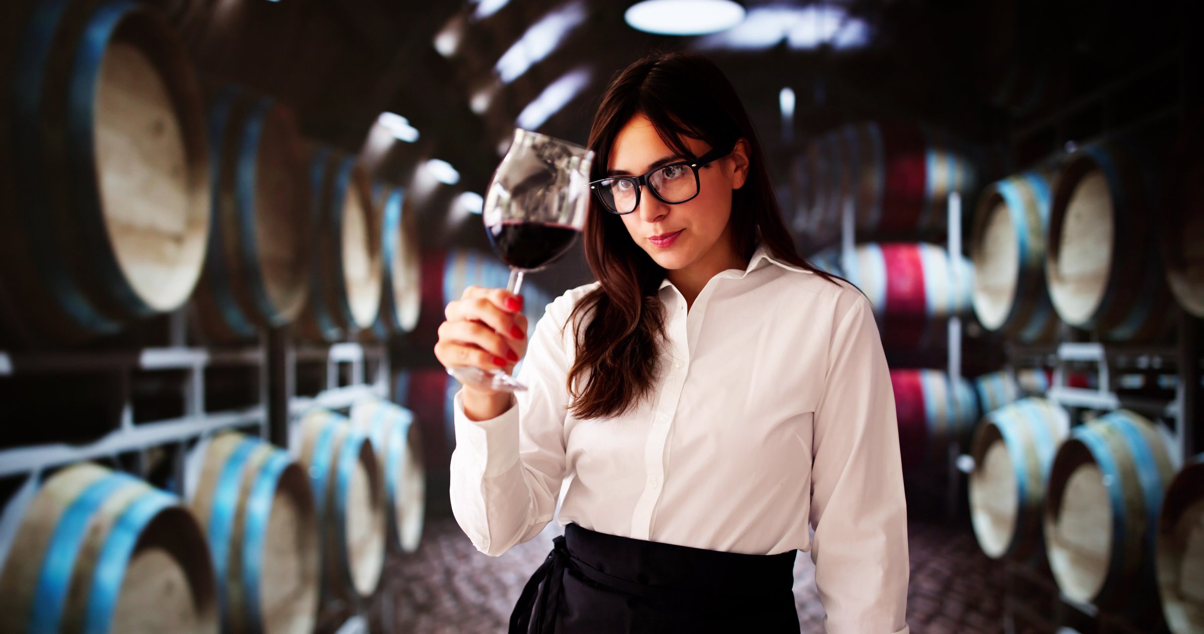 Sommelier Person Doing Smell And Flavor Test For Alcohol Drink. Glass Of Wine