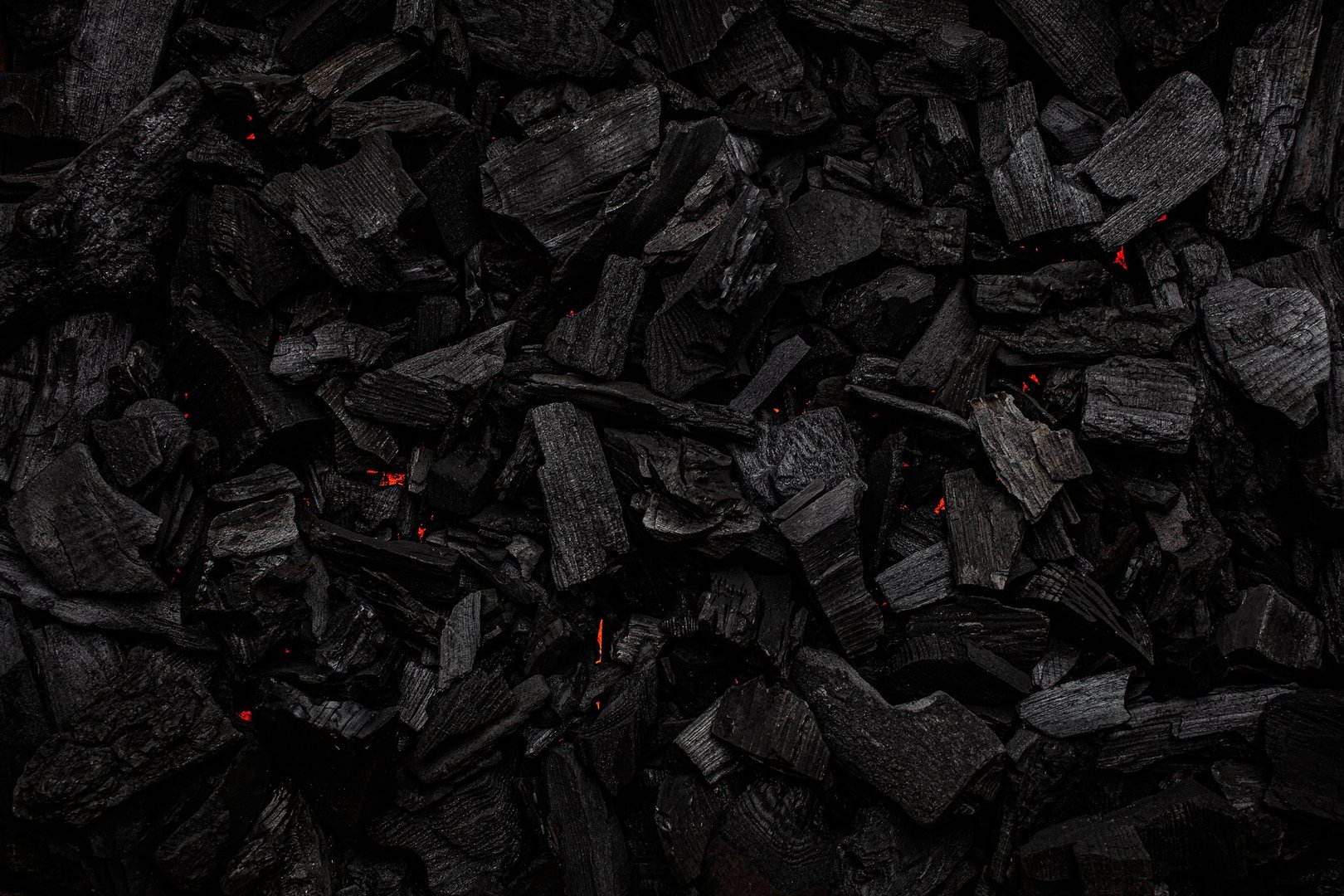 Charcoal with red streaks of heat
