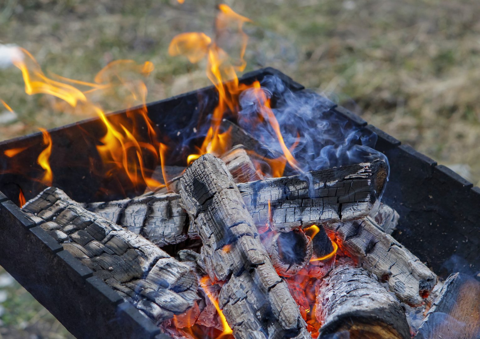 Mesquite wood burning with flames