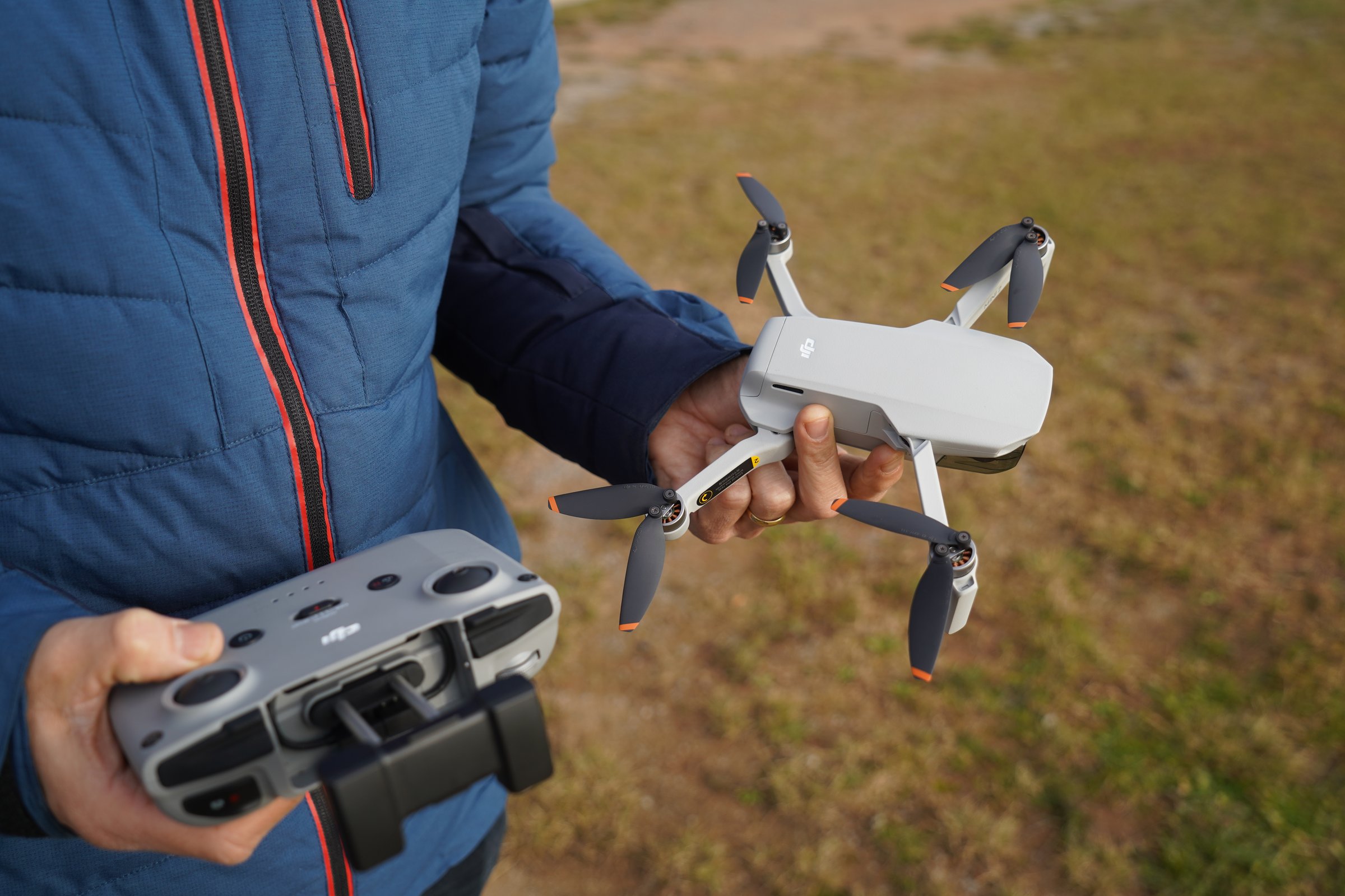 Barcelona, Spain, December 15, 2020, dji mavic mini 2 and controller in the hands of a pilot