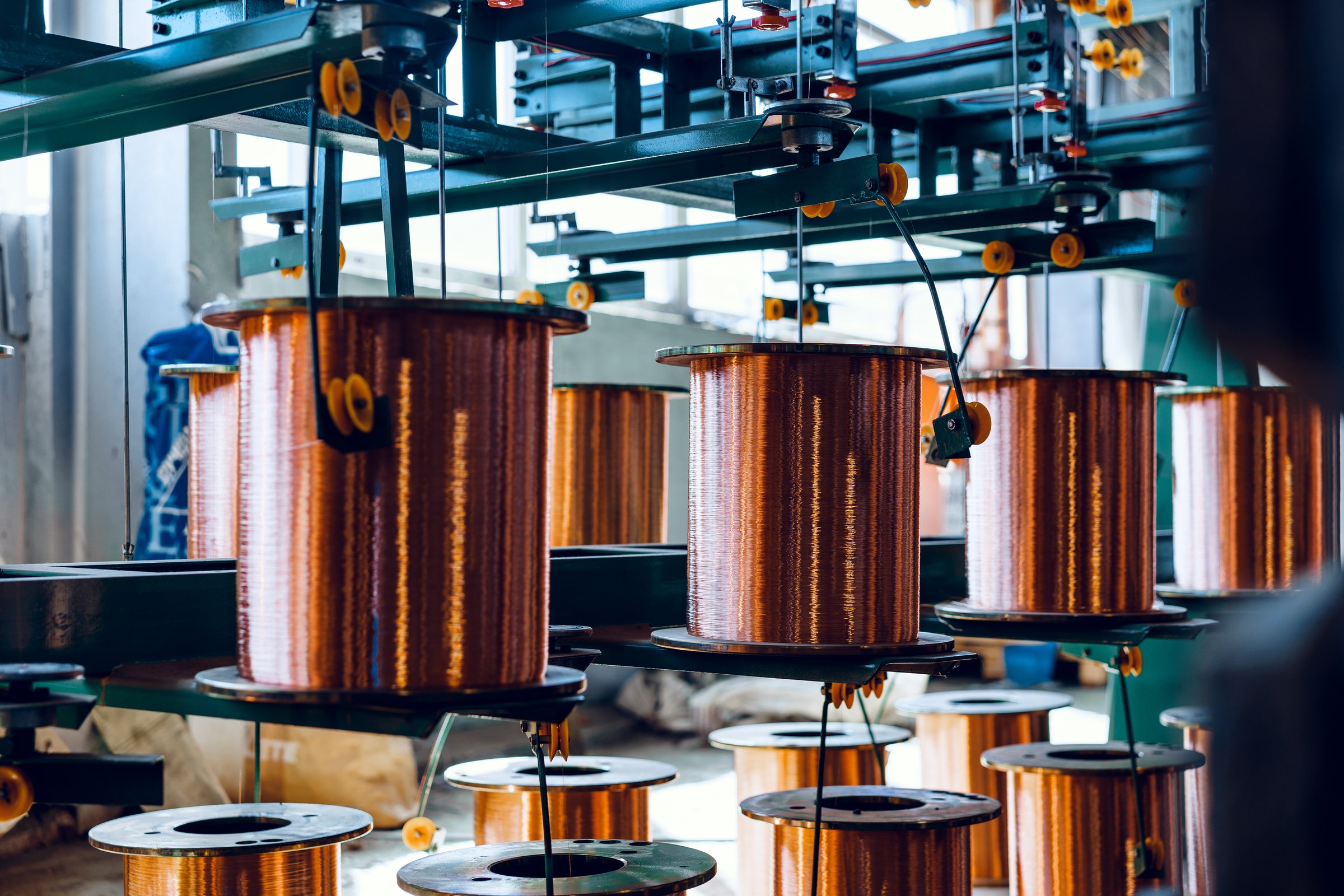 Production of copper wire, cable in reels at factory. Cable factory. Close up.