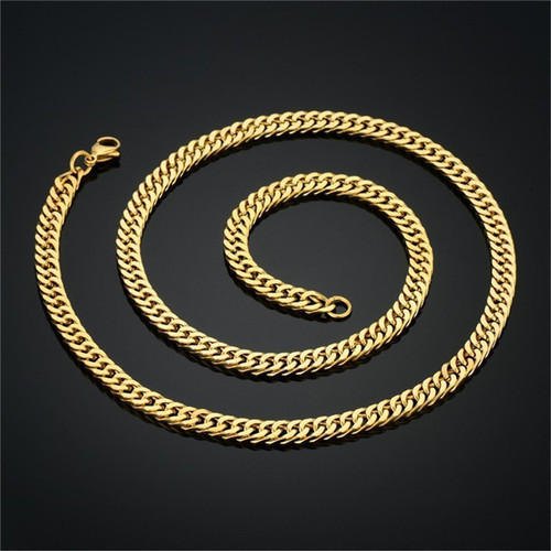 A gold chain necklace with a lobster clasp, stylishly coiled on a black background, showcasing its intricate interlocking design.