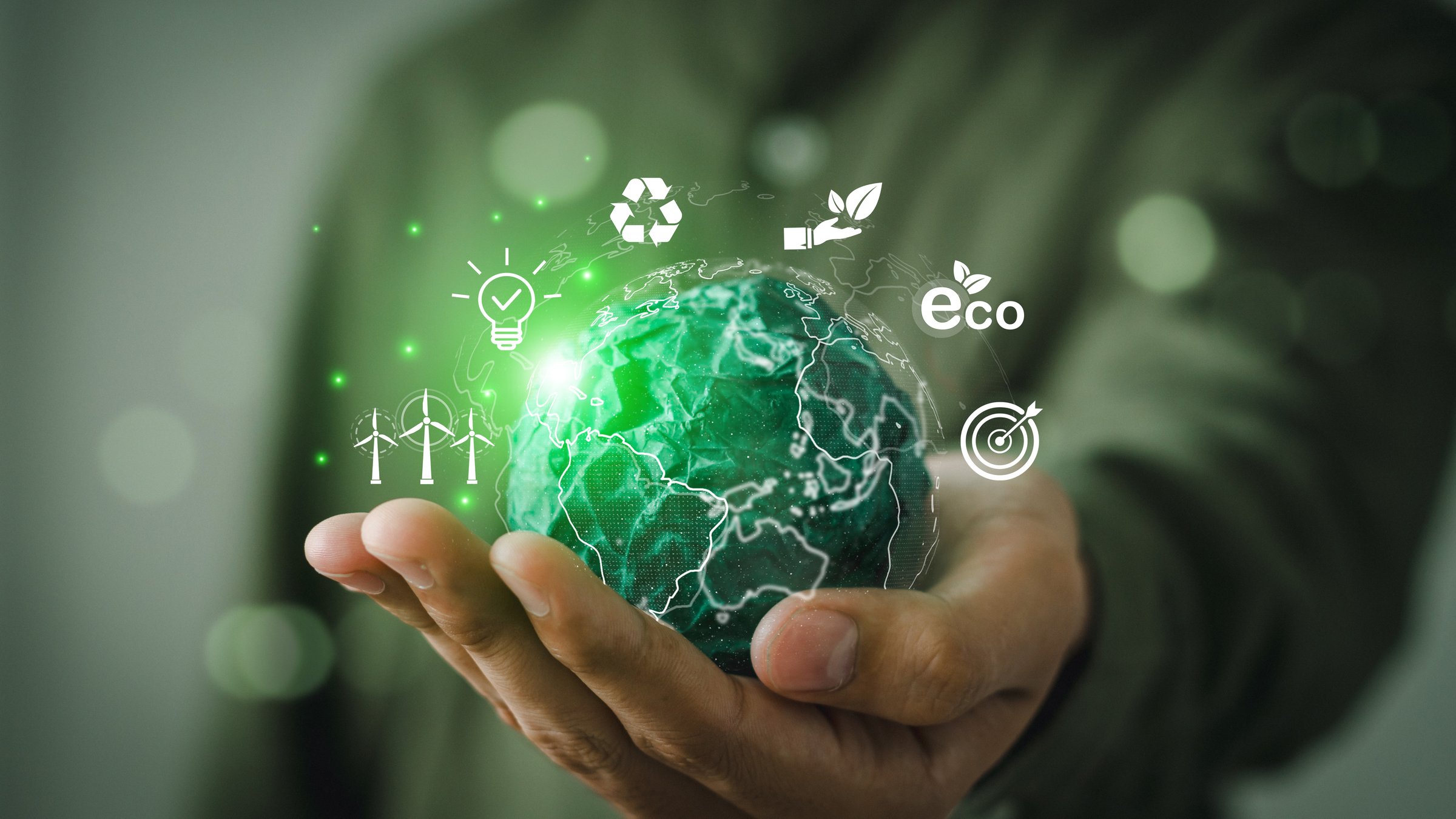 business hands holding the green world for the Sustainable Development Goals.Corporate social responsibility CSR.World Environment Day. Responsibility for the environment. Save and protect the world.