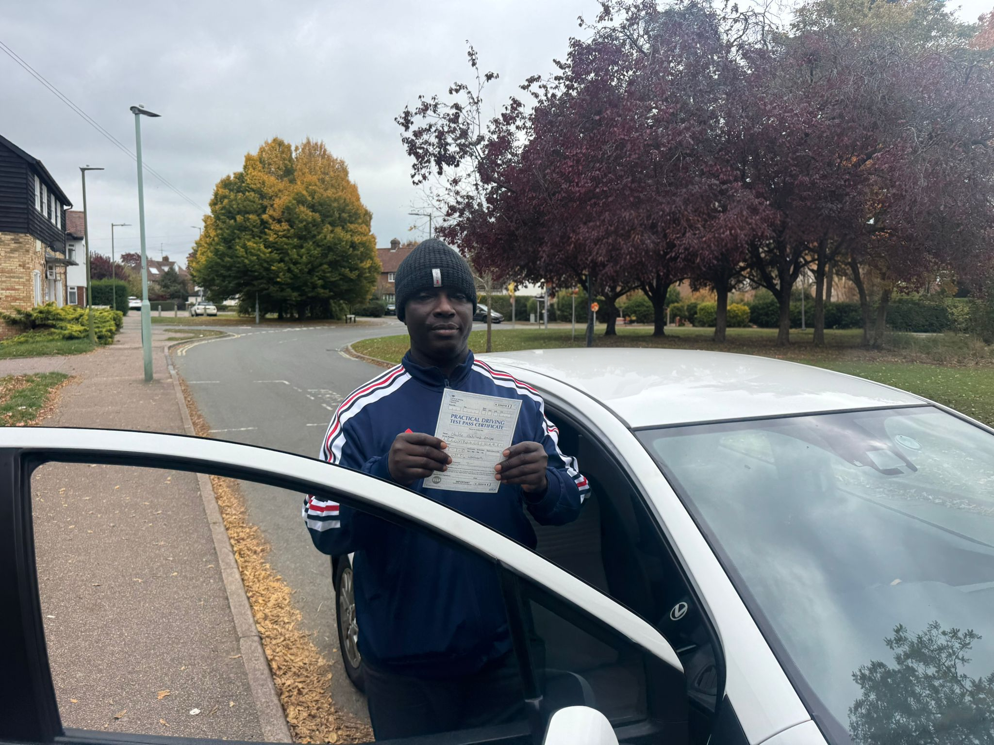 Successful driving test student with pass certificate