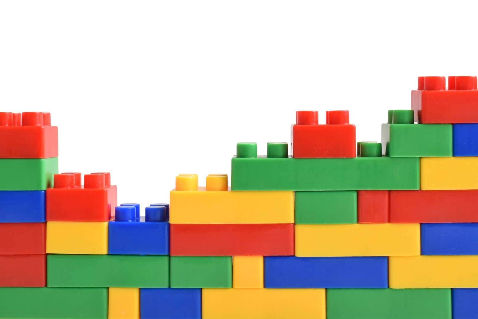 Plastic building blocks isolated on white background.