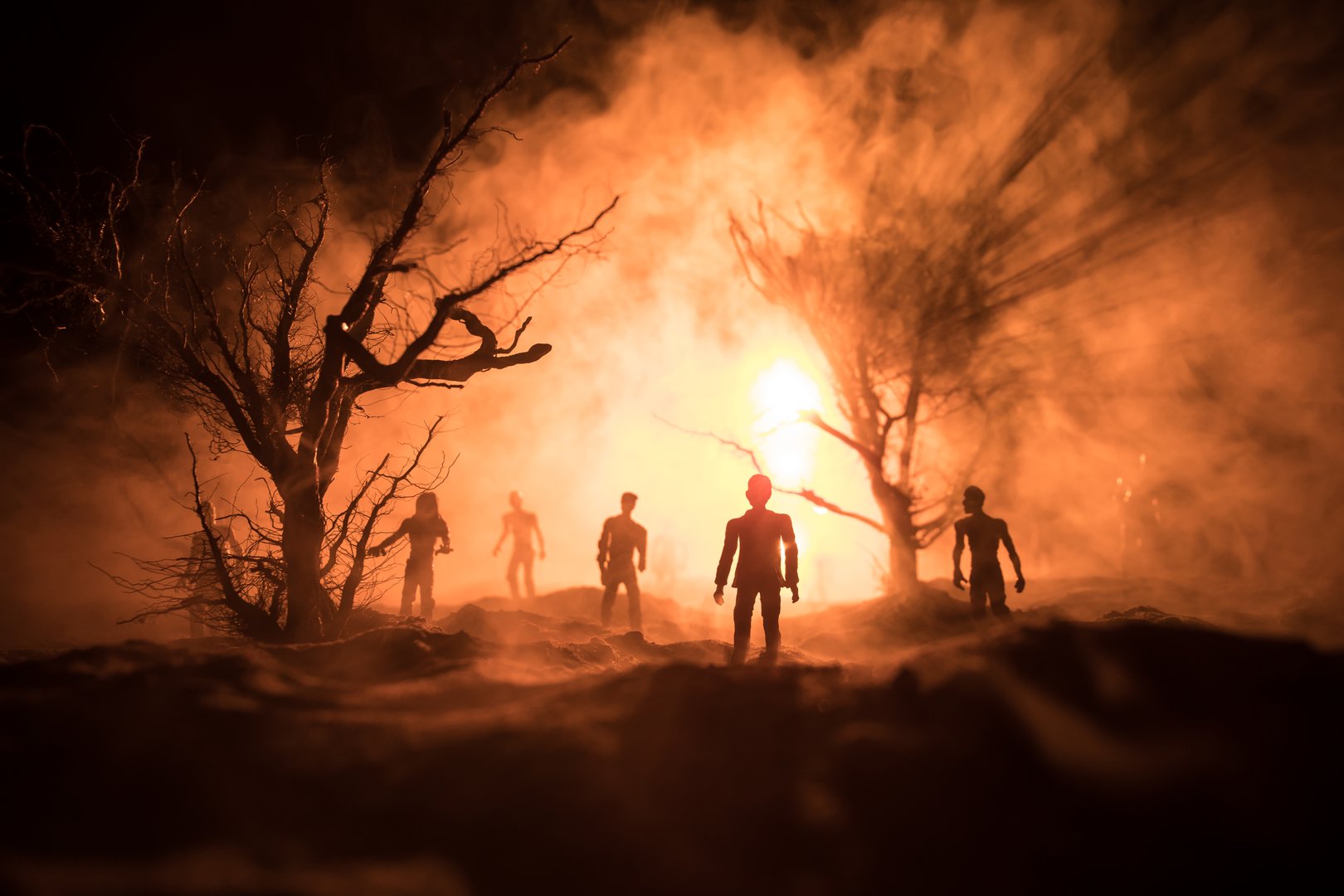 Silhouette of person standing in the dark forest with light. Horror halloween concept. strange silhouette in a dark spooky village