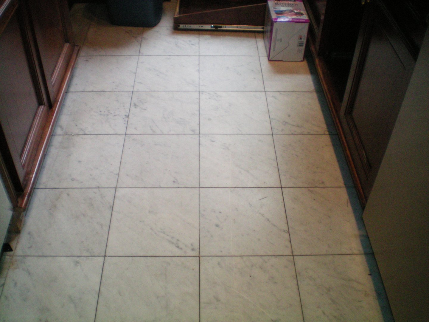 Marble tile kitchen before grout restoration