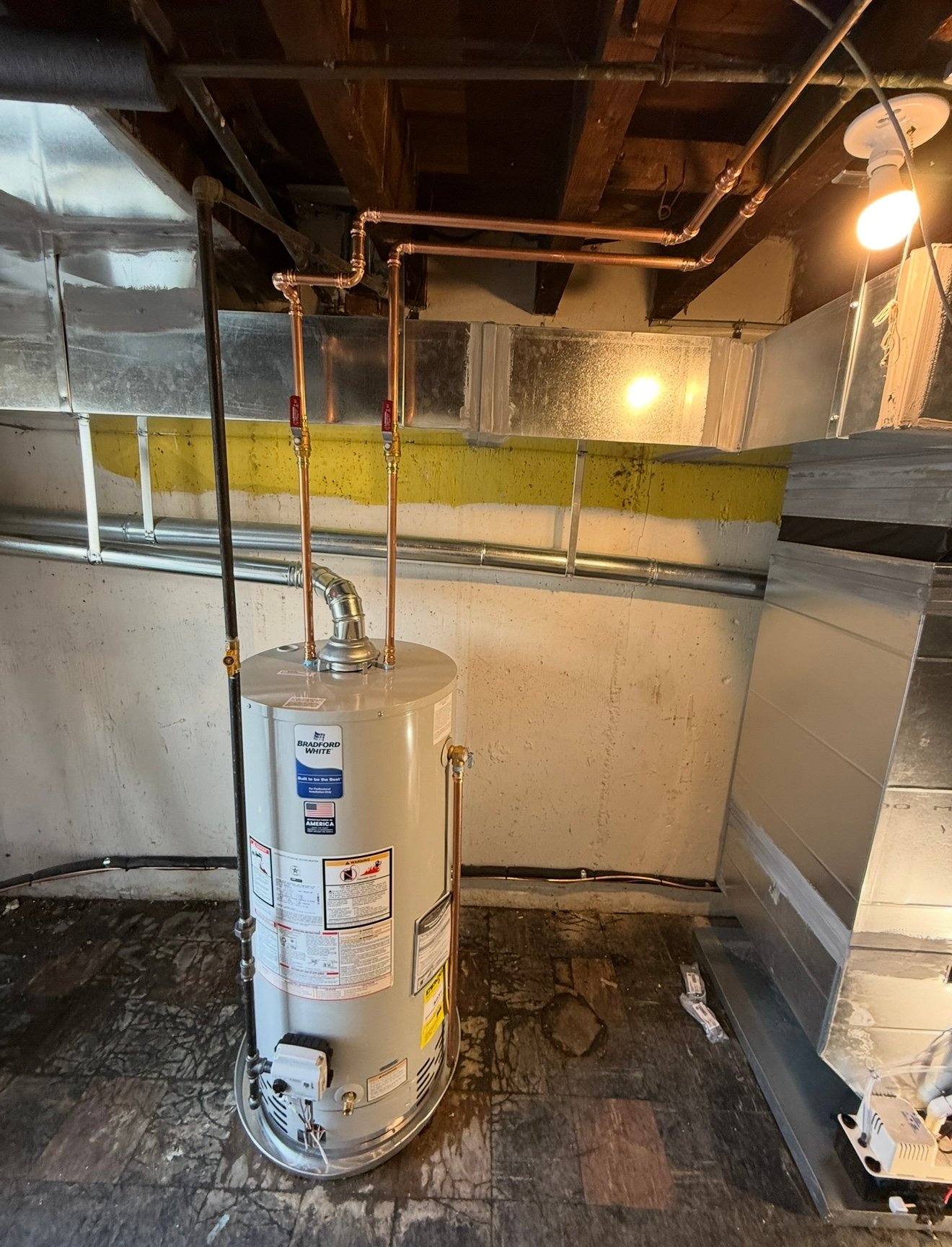 New Goodman system with upgraded ductwork and Bradford White water heater